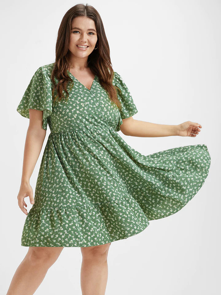 BLOOMCHIC V-NECK DITSY FLORAL RUFFLE HEM FLUTTER SLEEVE GREEN DRESS – The  Plus Bus Boutique